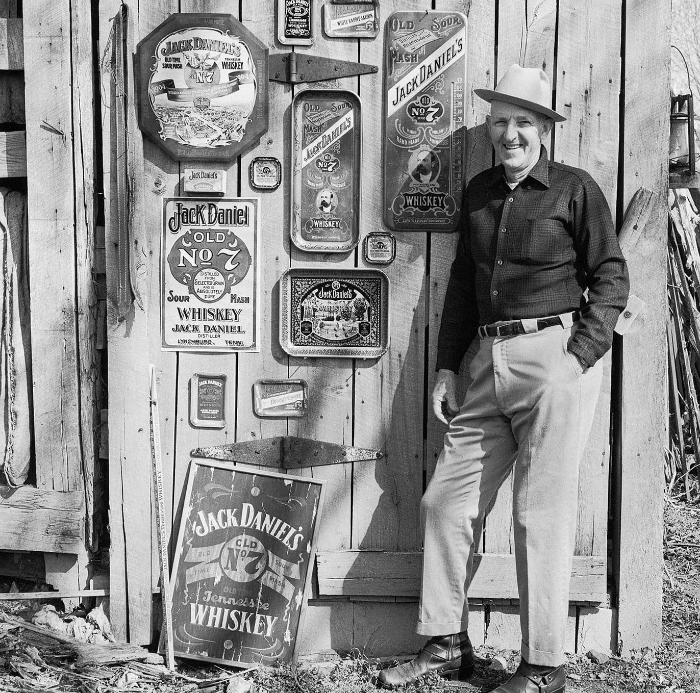 Black and white fence backdrop with props