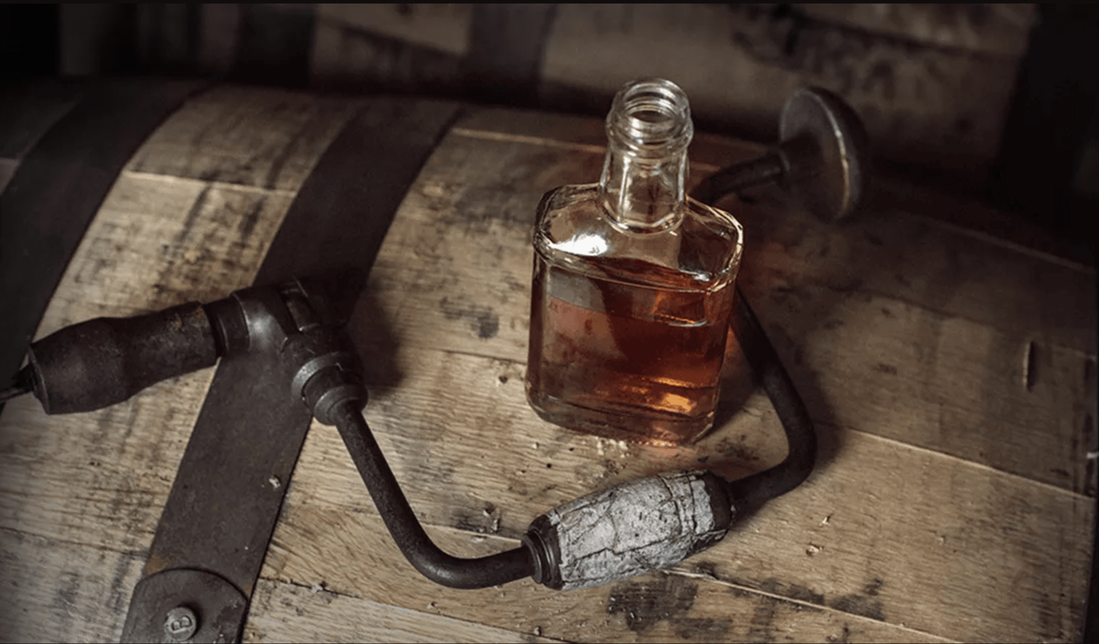 Barrel with hand drill and sample bottle